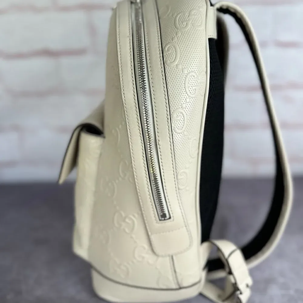 Gucci Embossed Leather Print Gg Backpack